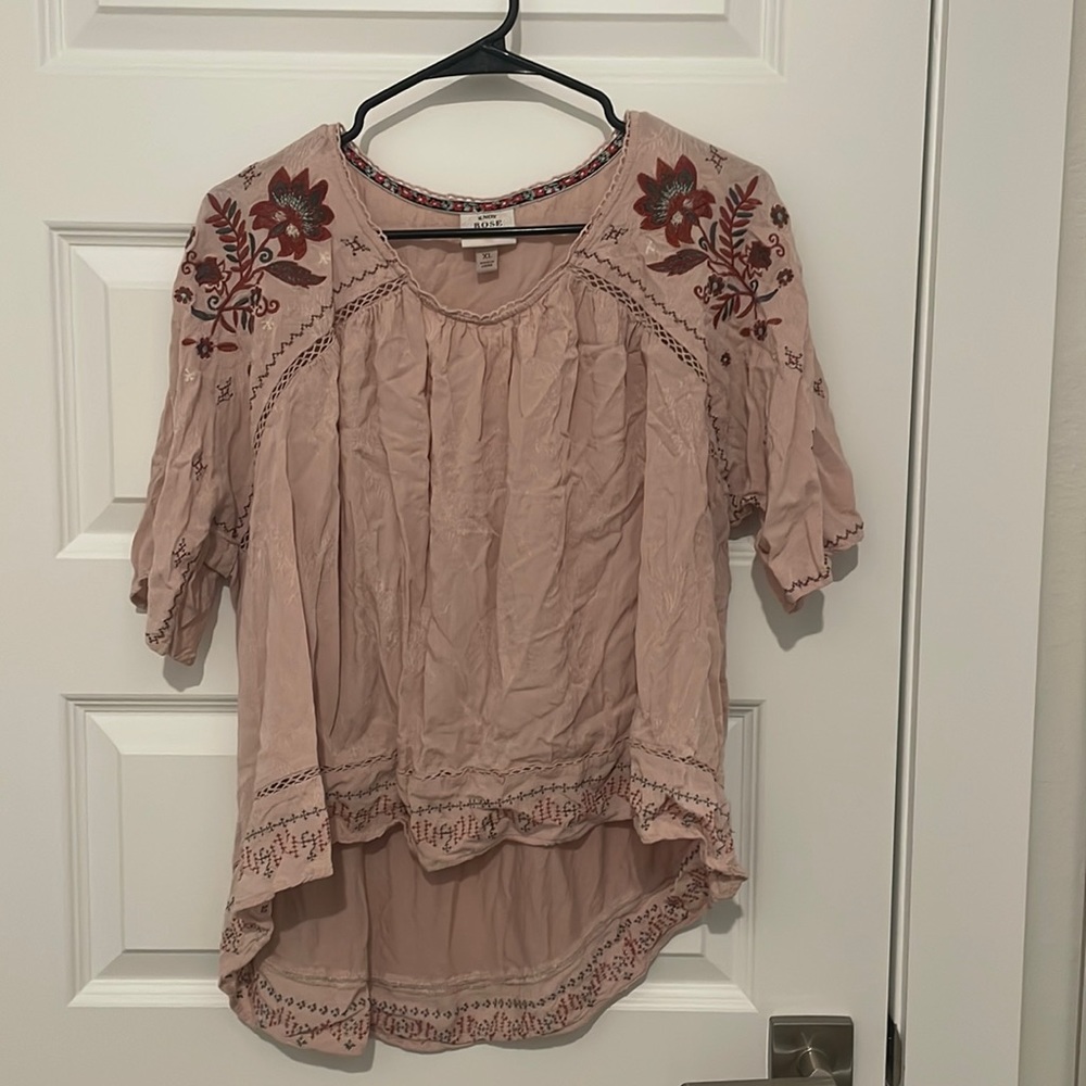 Light pink with embroidery detail on sleeves